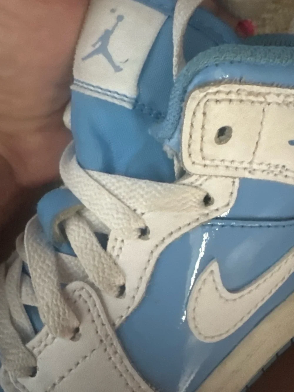 Jordan 1 Retro High OG in University Blue, Black & White